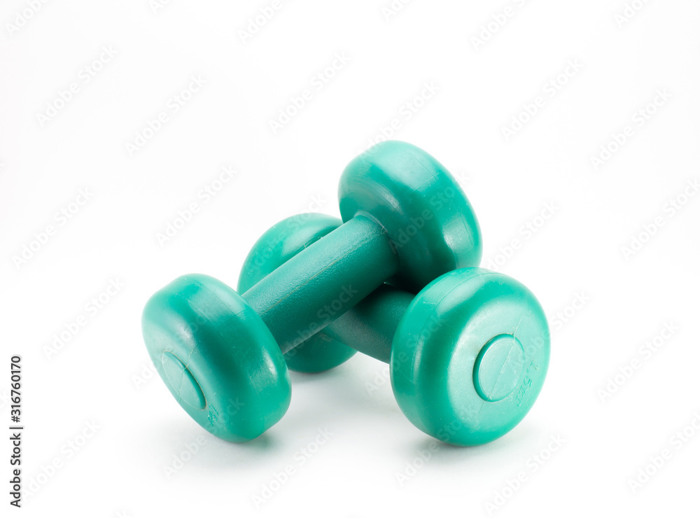 Two green 5kg dumbbells on a white background. Two green 5kg dumbbells on a white background.
