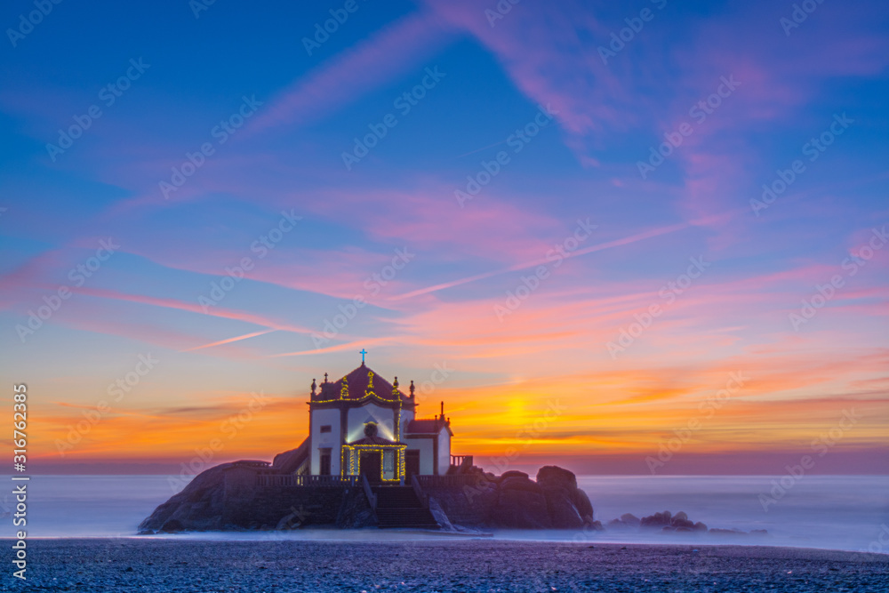 Fototapeta premium Drone, zoom, church, chapel, peace, love, faith, sunset,aerial, beach, beautiful, chapel, church, colors, drone, faith, fiar, sea, beach, beautiful, waves, stones, sand, heat, colors, fiar, fire,