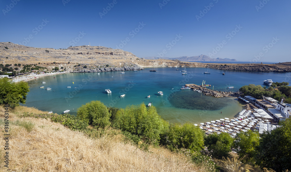 Vliha Bay and Beach of Lindos, overview of  from the Acropolis. Lindos, Rhodes, Greece