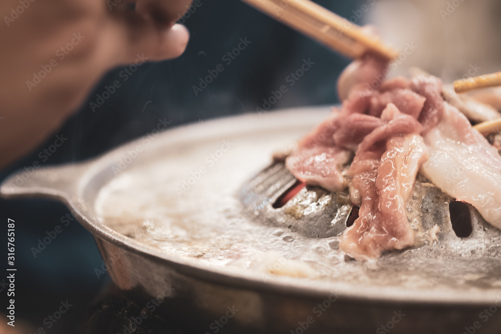 Fototapeta premium Thai barbecue Grill Pork on hot pan