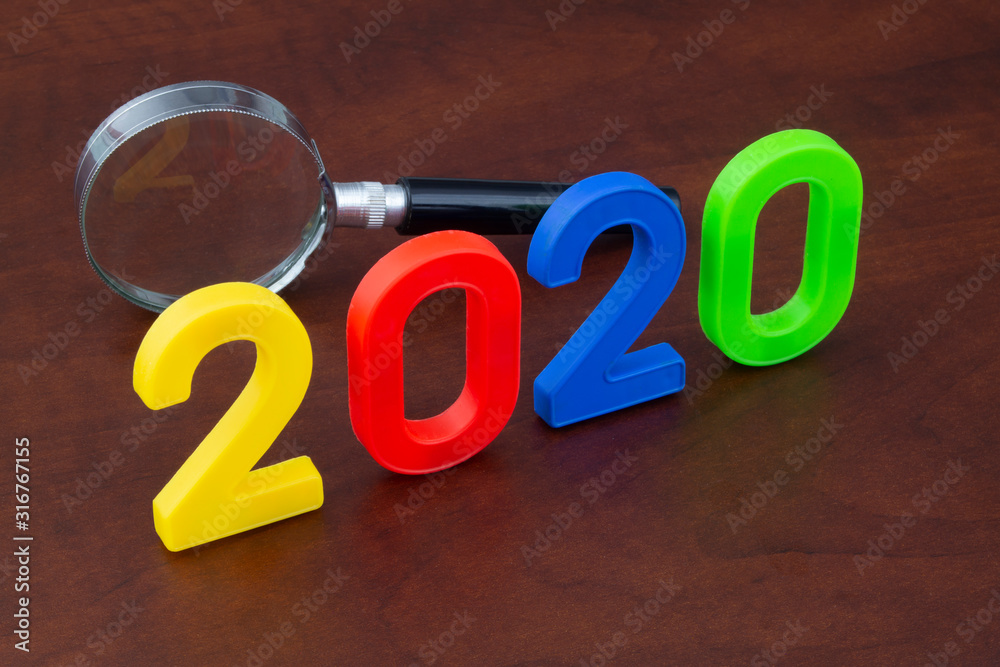 Events review in 2020 concept. Magnifying glass and numbers 2020. Events review in 2020 concept. Magnifying glass and numbers 2020.