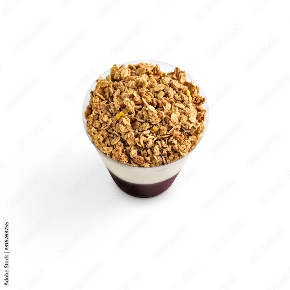 A refreshing smoothie with cream and granola on top. A delicious and healthy option for your breakfast or dessert. A refreshing smoothie with cream and granola on top. A delicious and healthy option for your breakfast or dessert.