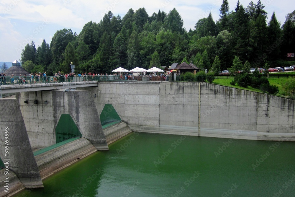 Dam and water reservoir in Niedzica, next to the lake Czorsztyn, southern Poland, Europe. 