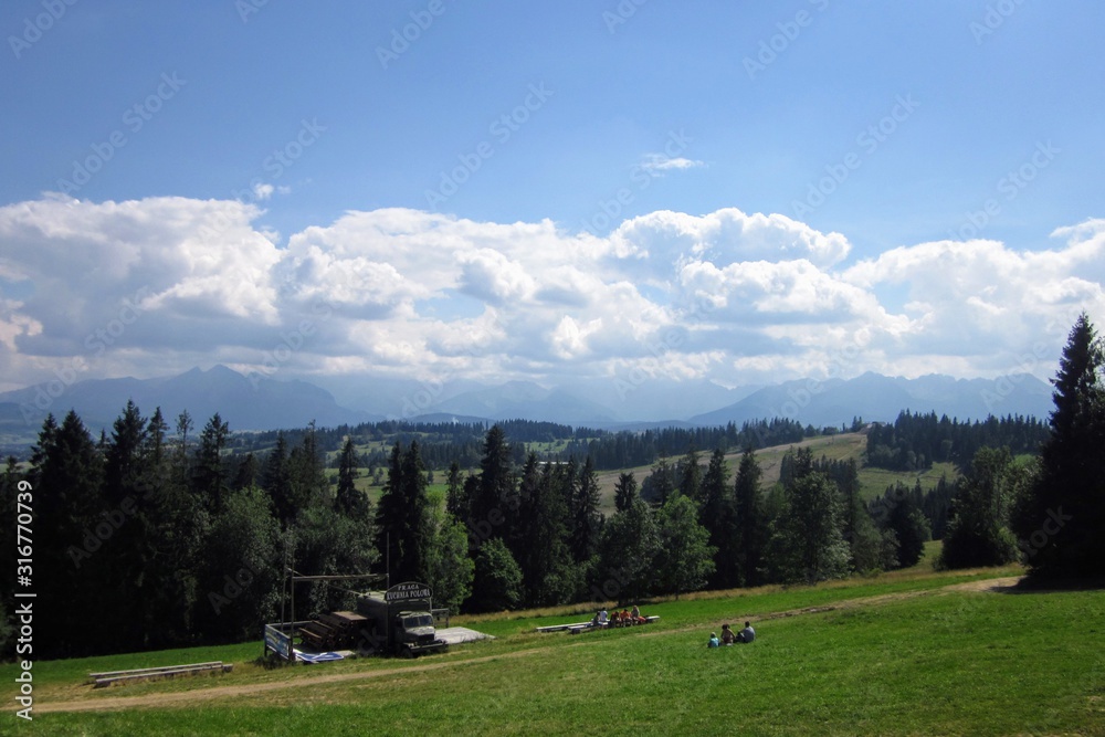 Picturesque landscape - Pieniny mountains, Poland.  Cloudy summer day in mountains.  Dark clouds over green mountain hills