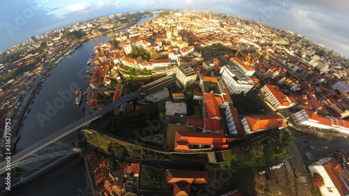 Beautiful super wide-angle aerial view of Porto, Portugal, with Douro river and Dom Luis I Bridge. Drone Photo