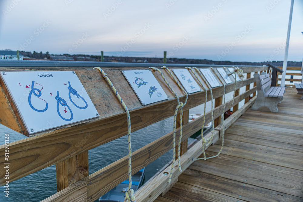 Naklejka premium Evening in Wells, Maine harbor during winter.