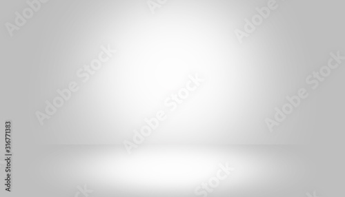 Gray empty room studio gradient with spotlight used for background and display your product