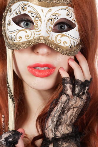 Portrait of young woman with eye mask © moodboard