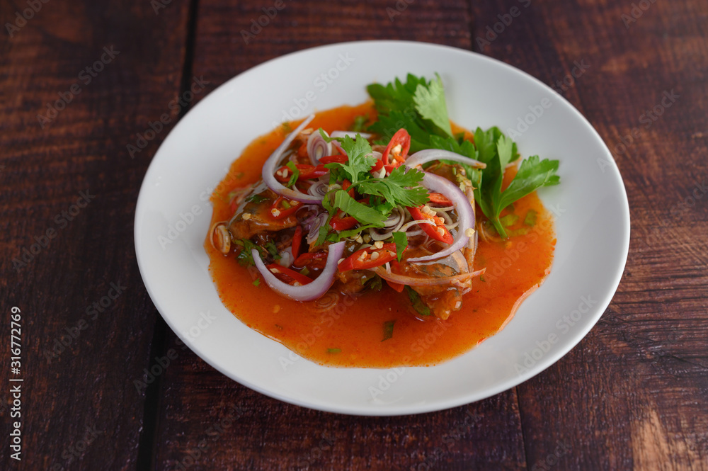 Spicy Canned Sardine Salad with tomato sauce in white dish