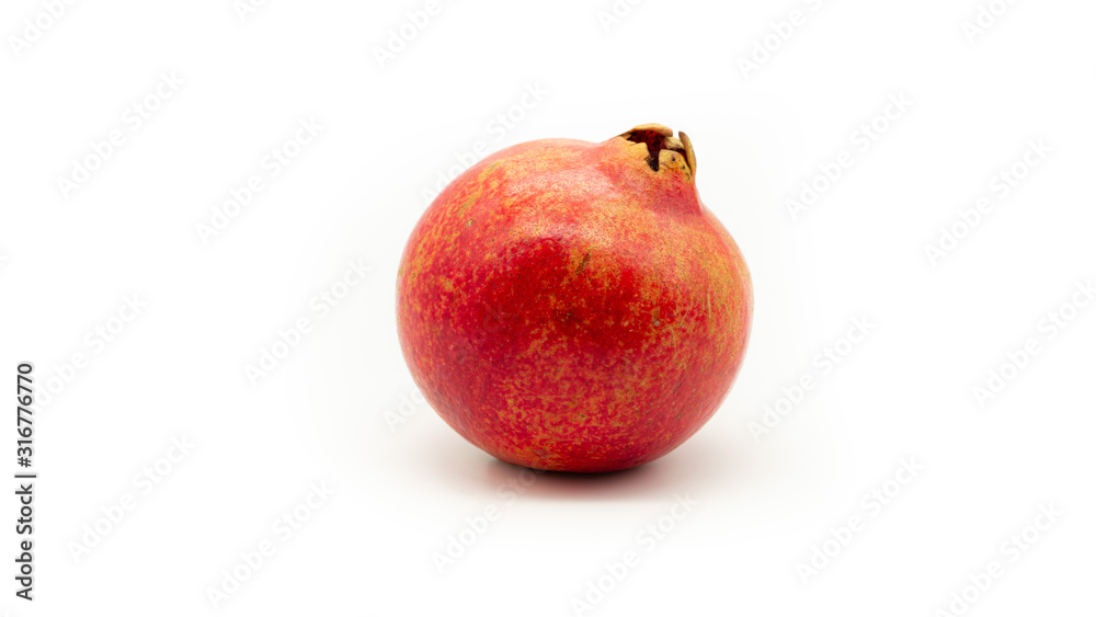Red pomegranate on a white background. Isolated Red pomegranate on a white background. Isolated