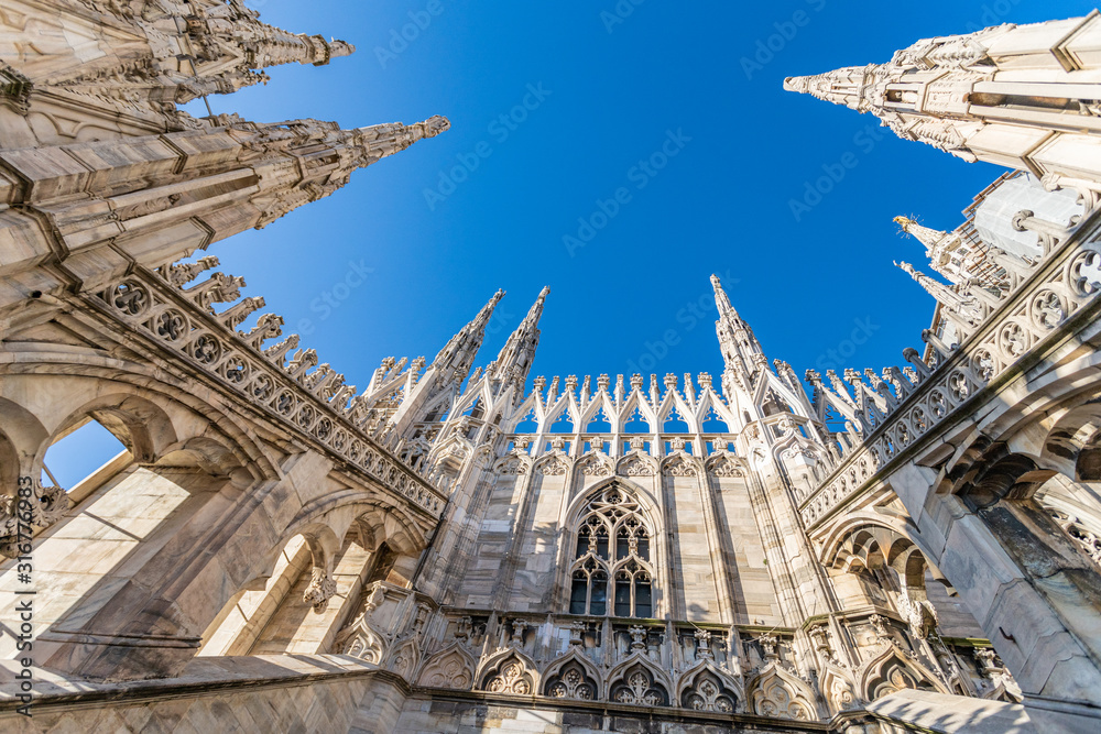 Detail view from top of famous Cathedral Duomo in Milan, Italy