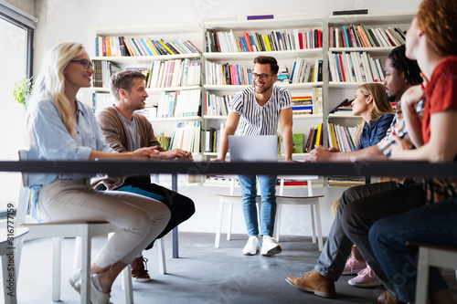 Group of successful business people designers architects in office