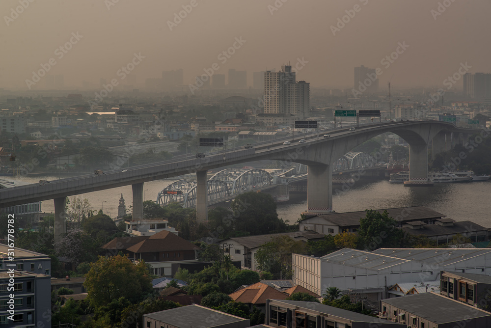 Aerial view of Rama III Bridge  and the nearby The Krungthep Bridge cross over Chao Phraya river, Landscape view of river and the Rama III Bridge.
