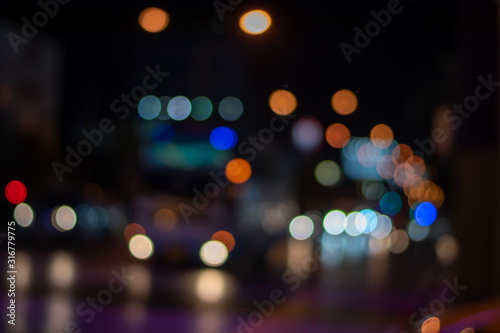 Blurred images of the front of the car on the road at night © PBXStudio