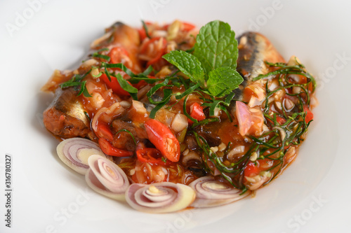 Appetizers with sardine in tomato sauce and spicy