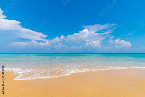 Beautiful clear sea beach white sand against blue sky with cloud