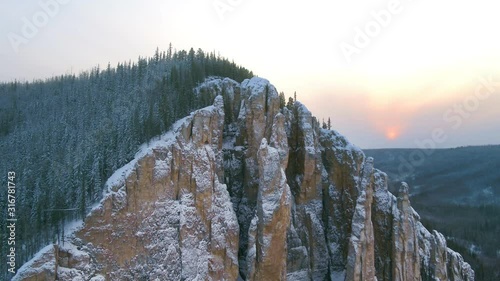 Rocks and woods in winter Siberia