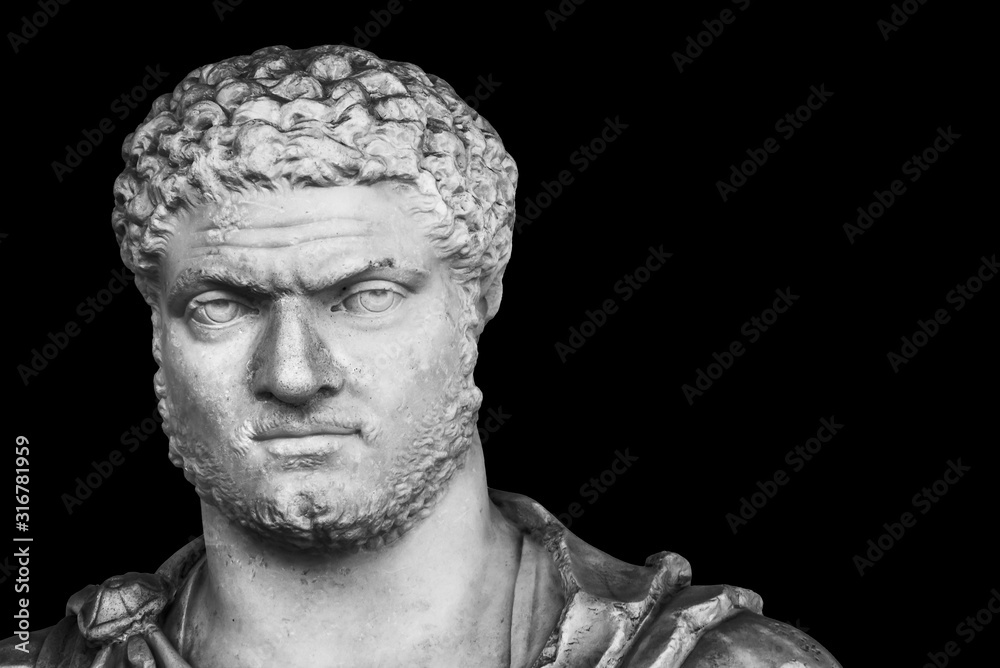 Roman statue of grumpy man - black and white photo in closeup