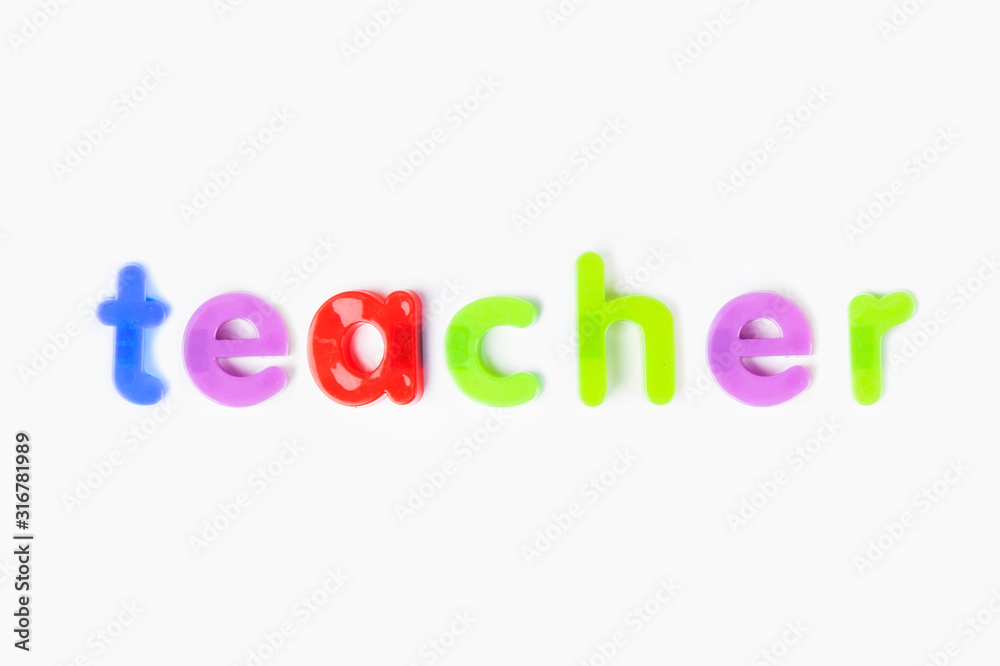 Alphabet magnets spelling 'teacher' over white background Alphabet magnets spelling 'teacher' over white background