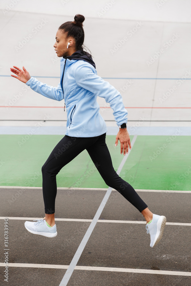 Beautiful young fit african sportswoman Beautiful young fit african sportswoman