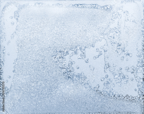 Natural frost patterns on window glass