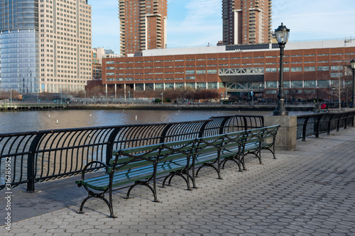 Empty Bench at Battery Park in New York City along the Hudson River