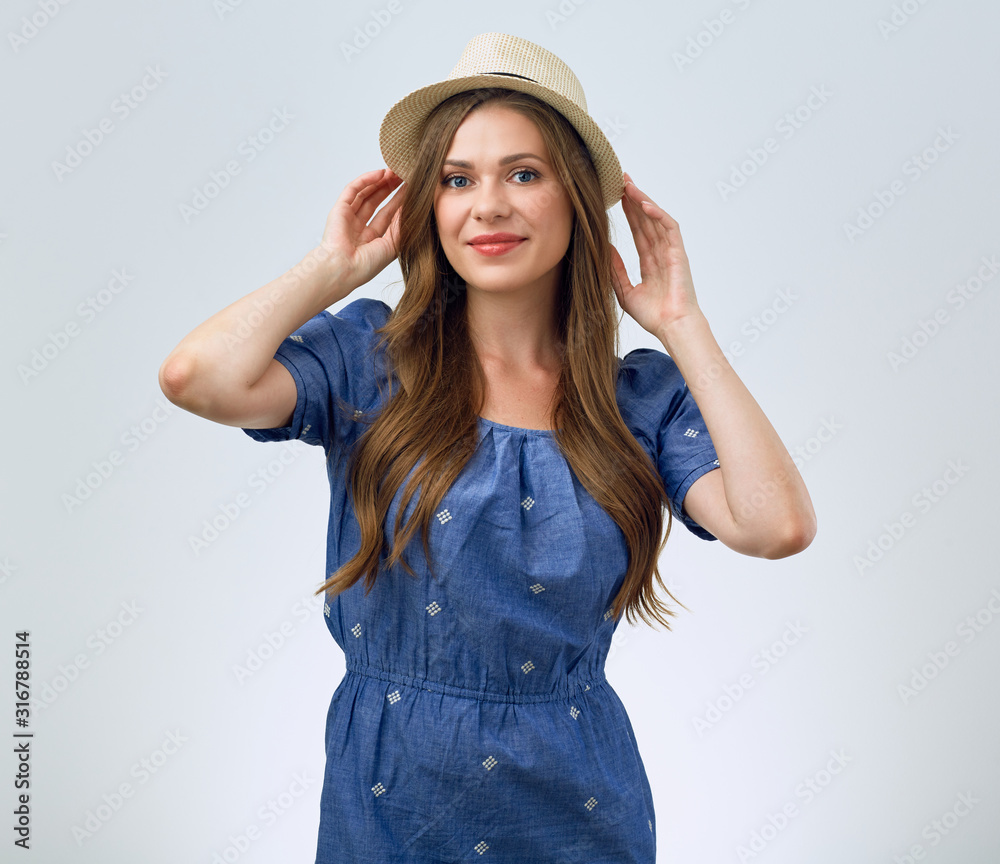 beautiful smiling woman dressed casual touching hat. beautiful smiling woman dressed casual touching hat.