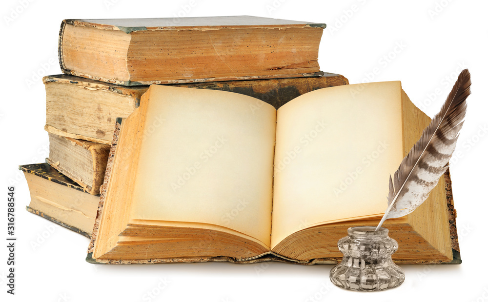 Isolated old books. Open book with empty pages, stack of old books and  inkwell isolated on white background with clipping path Stock Photo