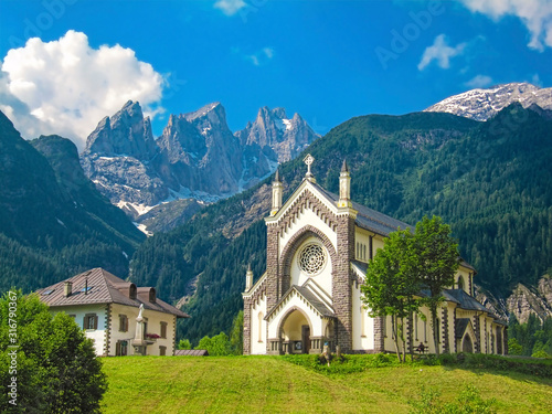 Church of Falcade in the Dolomites of Italy photo