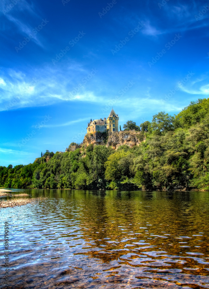 Chateau de Montfort by the River Dordogne Chateau de Montfort by the River Dordogne