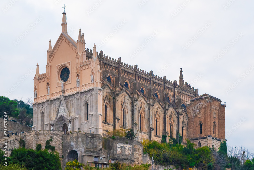 Fototapeta premium Gaeta (Italy) - The little port city on the sea, province of Latina, with 'Montagna Spaccata' broken mountain and 'Grotta del Turco' cave