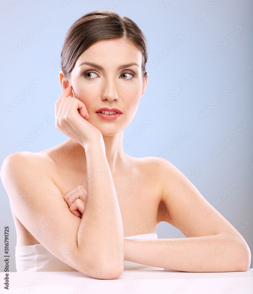 beautiful woman with natural skin looking away. beautiful woman with natural skin looking away.