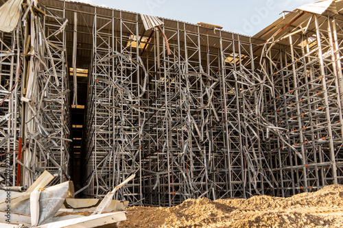 Obraz na plátne steel frame of a high-bay warehouse during demolition
