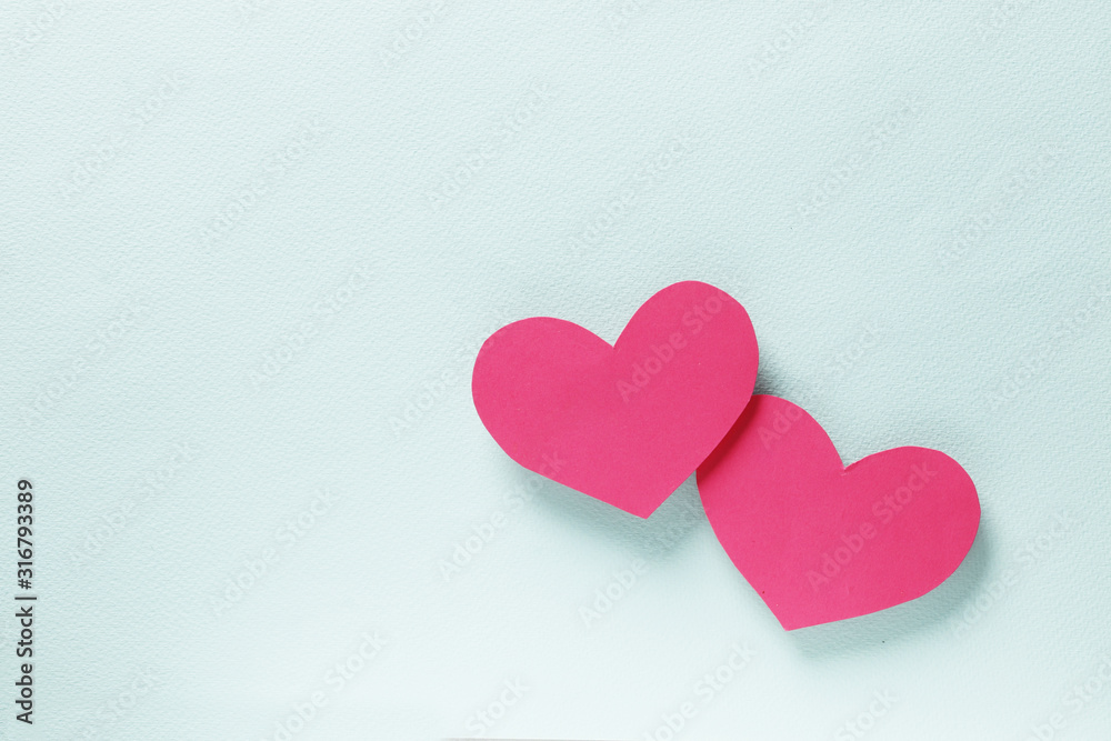 Decorative hearts on a blue background. Valentine's day decor concept. February 14