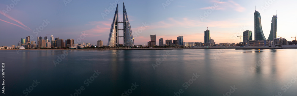 Bahrain skyline with iconic buildings during sunset
