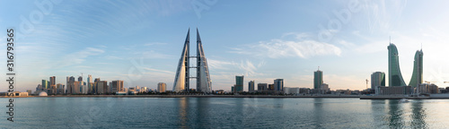 Bahrain skyline with iconic buildings during sunset photo