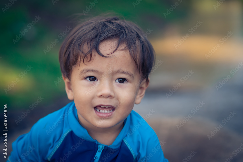 cute young boy playing and have a happy time
