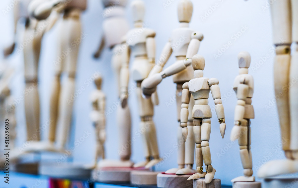 Wooden human artistic action figures at stationery store Wooden human artistic action figures at stationery store