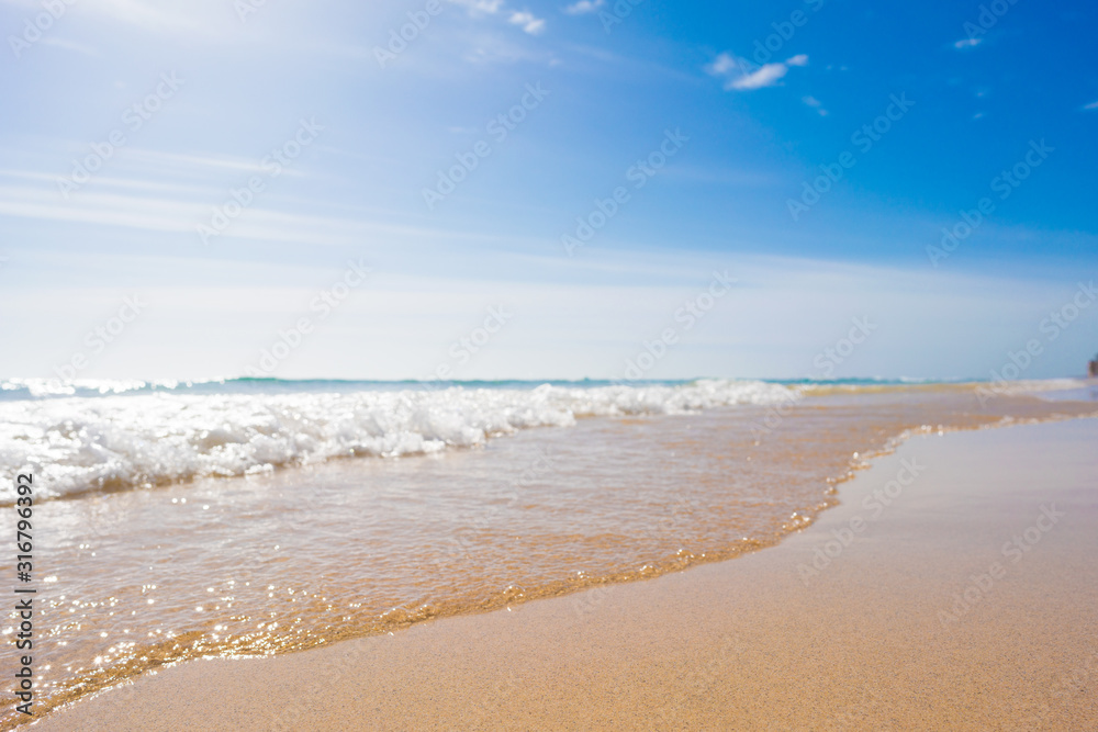 Sandy beach and calm sea in the Canary Islands