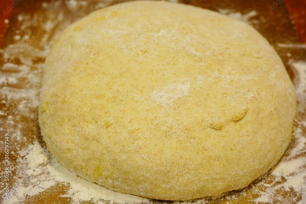 Making a ball with proofed yeast dough for miracle overnight no knead bread Making a ball with proofed yeast dough for miracle overnight no knead bread