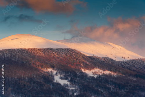 Sunrise over Polonyna Wetlinska and Carynska in Carpathian Mountains. Bieszczady, Poland at Winter Season