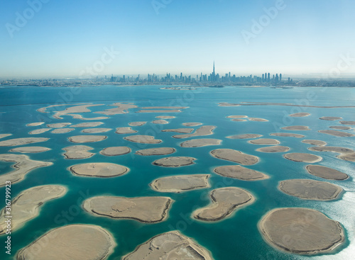 Photography Aerial view of Dubai Downtown district as viewed from the World Islands