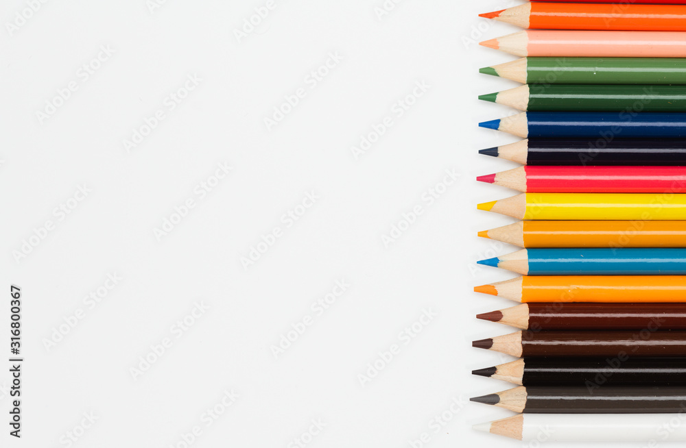 Multi color pencils. the concept of a multinational family and equality in the world. Multi color pencils. the concept of a multinational family and equality in the world.
