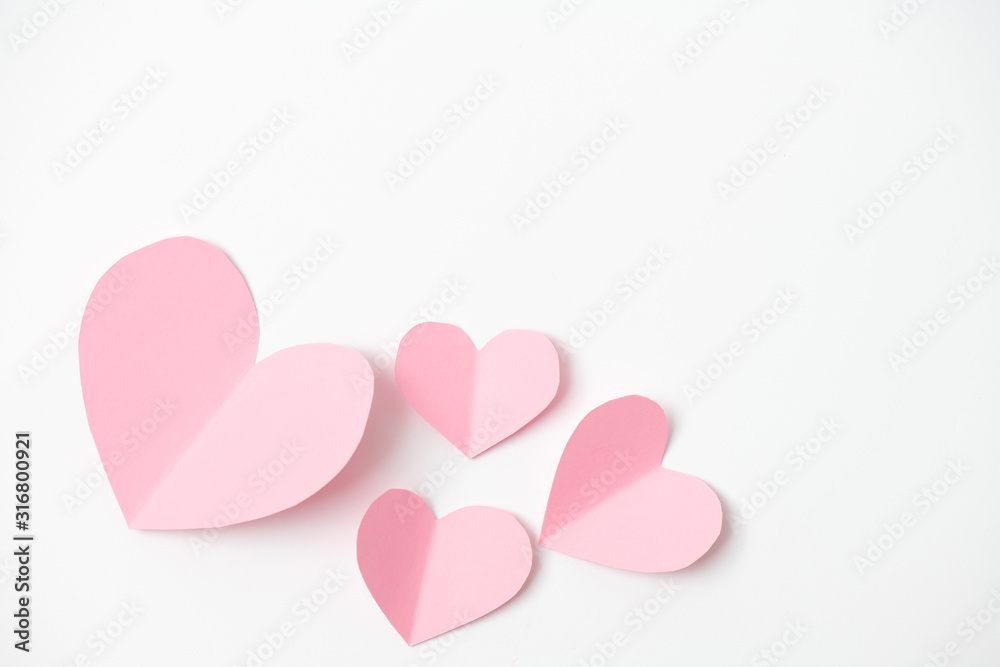 Shape of heart flying on white paper background.