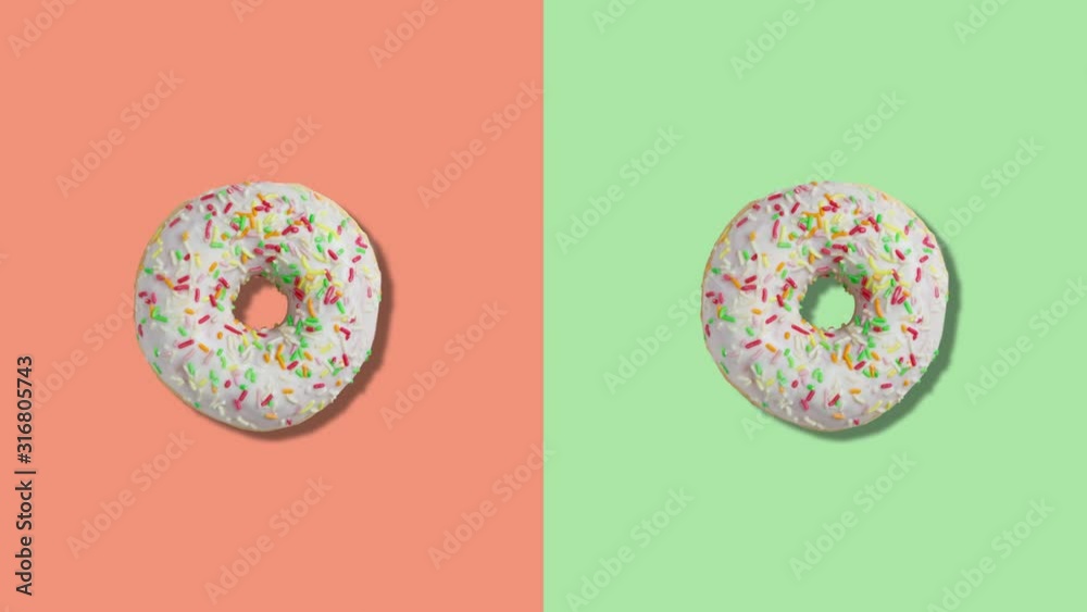 Glazed donuts with pastry topping. Two rotating donuts on orange and