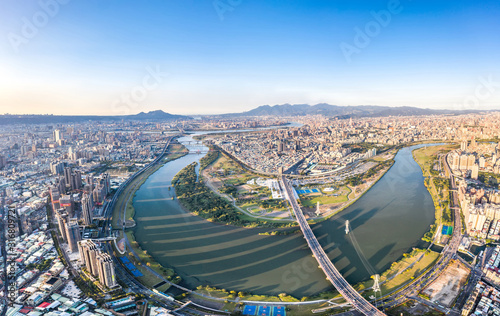 Taipei City Aerial View - Asia business concept image, panoramic modern cityscape building bird’s eye view under daytime and blue sky, shot in Taipei, Taiwan.