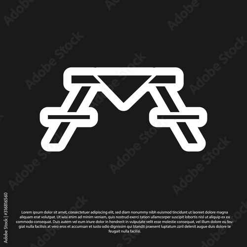 Black Picnic table with benches on either side of the table icon isolated on black background. Vector Illustration