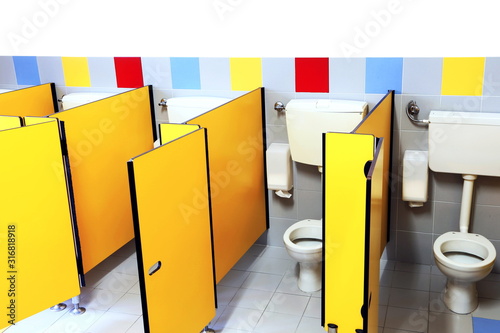 Fotografi cabins with small wc of a nursery school bathroom