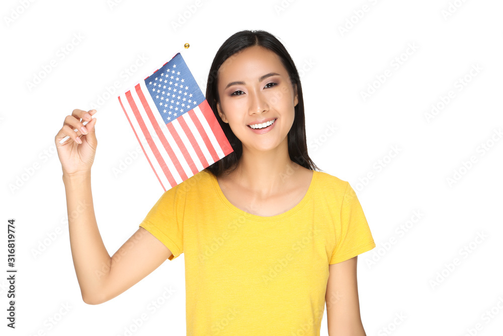 Young woman holding American flag isolated on white background