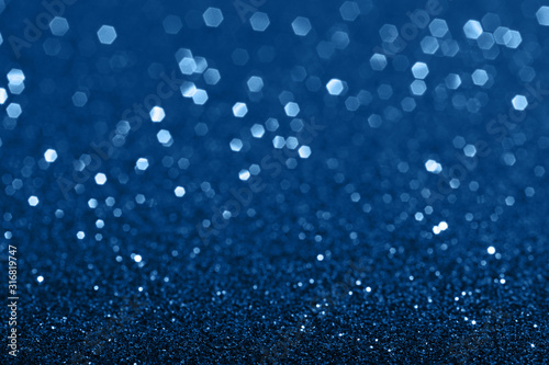 Abstract blue background with sparkling bokeh.Color of te year 2020.